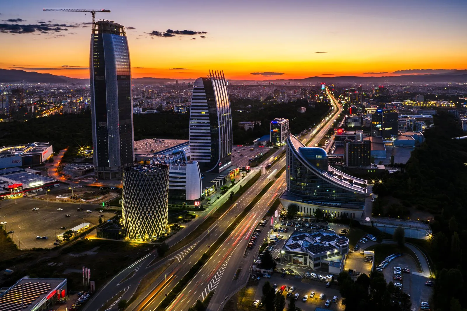 Aerial view of Sofia's modern towers at sunset. Photo by Yassen Kounchev.